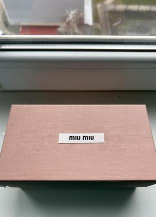 Солнцезащитные очки miu miu7 фото