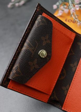 Мини кошелек женский раскладной брендовый на кнопке темно-коричневый с оранжевой вставкой3 фото