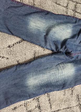 Теплые джинсовые штаны2 фото