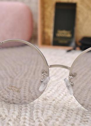 Красивые круглые  солнцезащитные очки с боковой шорой gian marco venturi gmv8595 фото