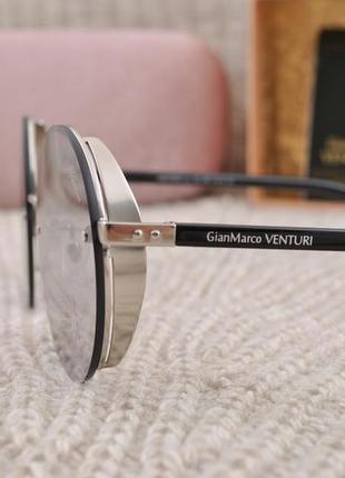 Красивые круглые  солнцезащитные очки с боковой шорой gian marco venturi gmv8594 фото