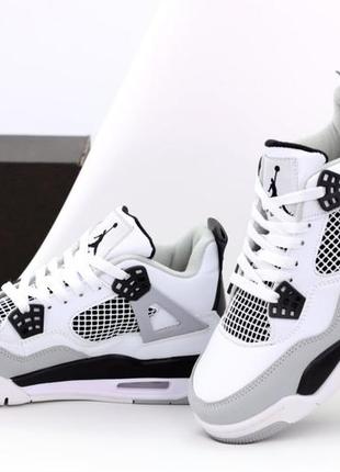 Жіночі кросівки nike air jordan 4 white black2 фото