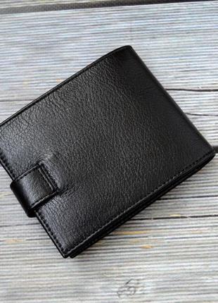 Шкіряний чоловічий гаманець чорного кольору3 фото