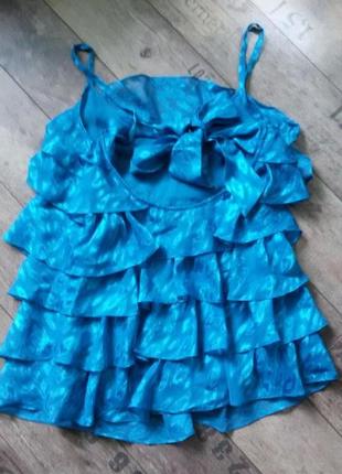 Новий красивий бірюзовий топ майка з рюшами