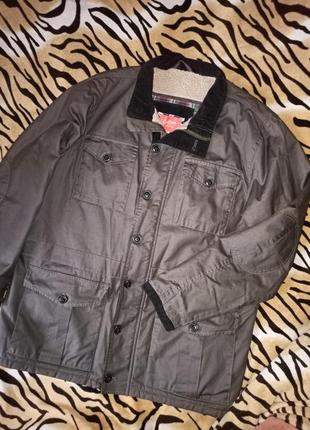 Новая теплая куртка,на наш 54-56разм.,xl.