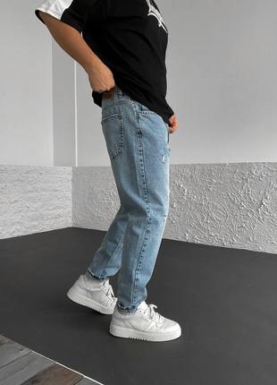 Чоловічі джинси блакитного кольору3 фото