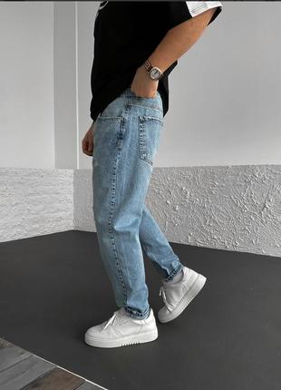 Чоловічі джинси блакитного кольору4 фото