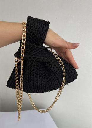 Вязаная черная сумочка узелок ручной работы.1 фото