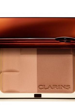 Двухцветная бронзирующая пудра clarins bronzing duo mineral powder compact spf 15 тон 03 dark