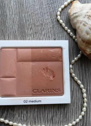Двухцветная бронзирующая пудра clarins bronzing duo mineral powder compact spf 15 тон 02 medium