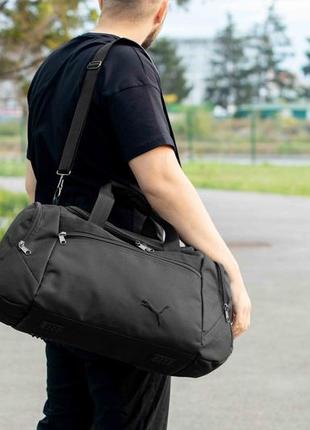 Мужская спортивная сумка дорожная  puma ta черная для поездок и тренировок вместительная на 36 литра9 фото