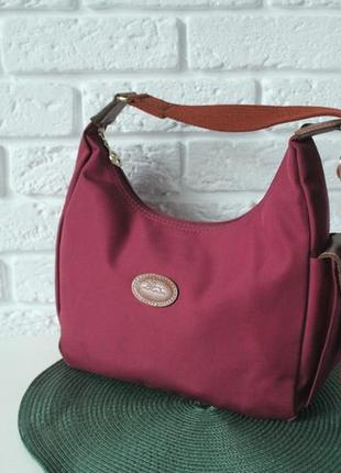 Дуже популярна, стильна сумочка хобо французького бренду longchamp.