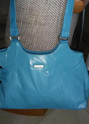 Новая кожаная сумка итальянского бренда голубого цвета.1 фото