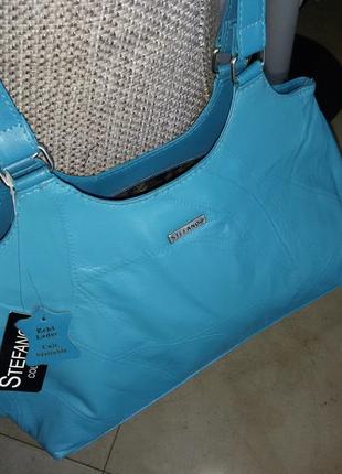 Новая кожаная сумка итальянского бренда голубого цвета.3 фото