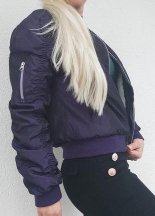 Теплая куртка ярко фиолетового цвета.2 фото