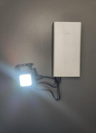 Ліхтар-брелок відкривачка з магнітом mini 500 lum чорний також працює від пави банку4 фото