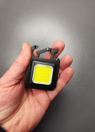 Ліхтар-брелок відкривачка з магнітом mini 500 lum чорний також працює від пави банку1 фото