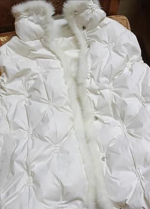Женская утепленная жилетка с мехом норки10 фото