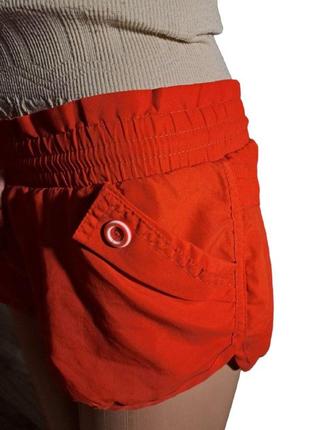Оранжевые короткие шорты из плащевки red lure ms2 фото