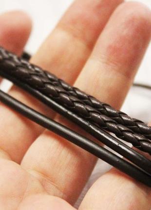 Крутой набор браслетов с пером в стиле бохо еко кожа бичевка перо браслет унисекс7 фото