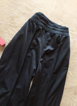 Стильные трендовые широкие брюки на флисе высокая талия на широкой резинке с карманами5 фото