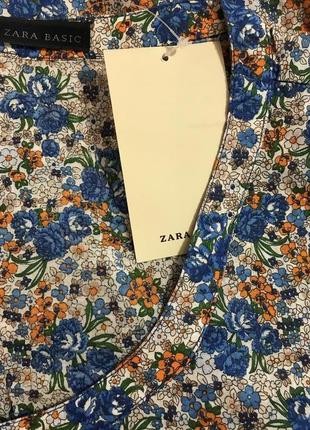 Очень красивая и стильная брендовая блузка в цветочках..100% коттон!