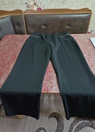 Брюки клеш