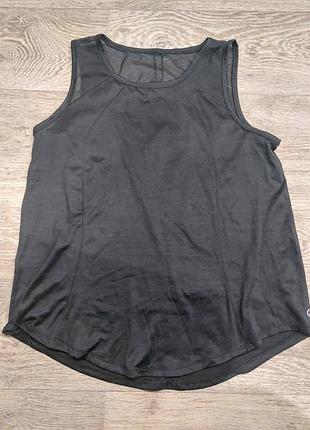 Жіноча майка для занять спортом.