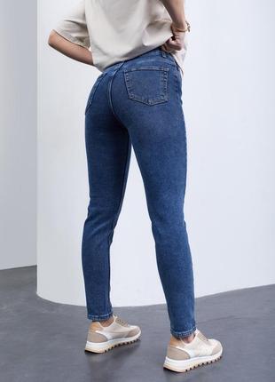 Укороченные джинсы-скинни с потертостями.2 фото