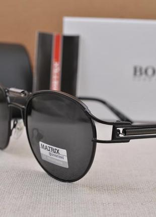 Фирменные солнцезащитные круглые мужские очки matrix polarized mt8213 с пружиной3 фото