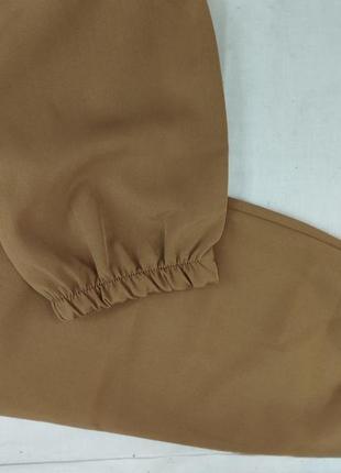 Штаны на резинке карго с карманами коричневые6 фото