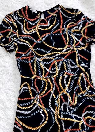 Трендовий сукню в канатах mango