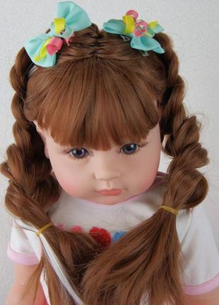 Лялька реборн 55 см веселка силіконова npk doll6 фото