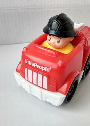Игрушка пожарный в машинке little people