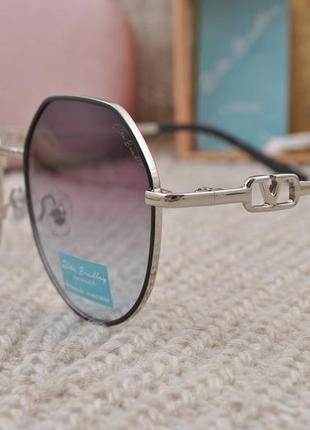 Фирменные солнцезащитные  очки  rita bradley polarized rb81223 фото
