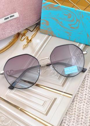 Фирменные солнцезащитные  очки  rita bradley polarized rb81222 фото