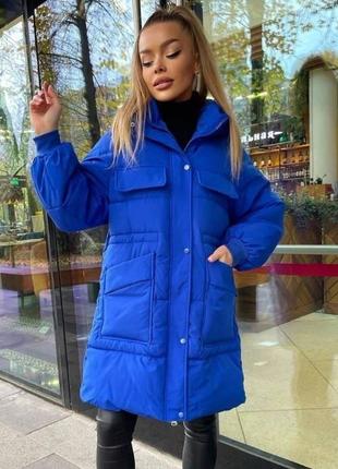 Куртка жіноча пуховик зимова синя однотонна на підкладці на блискавці з кишенями на кнопках міді тепла якісна з капішоном