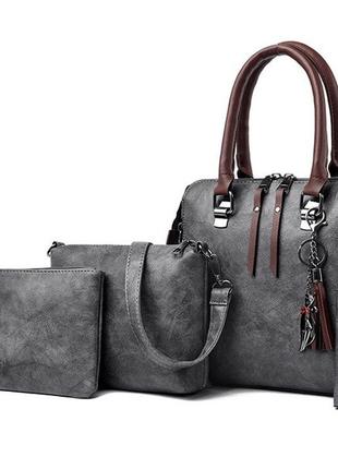 Женская сумка набор 4 в 1 комплект сумочка клатч визитница на плечо + брелок4 фото