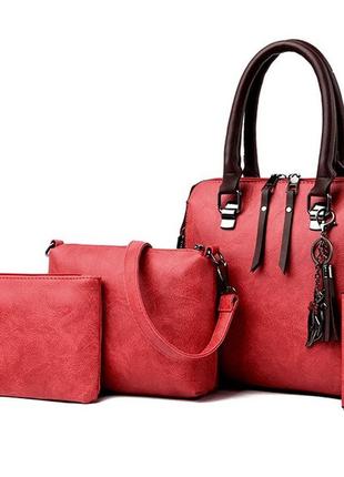 Женская сумка набор 4 в 1 комплект сумочка клатч визитница на плечо + брелок3 фото