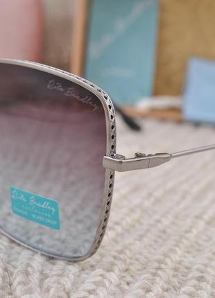 Фирменные солнцезащитные  очки  rita bradley polarized rb81114 фото