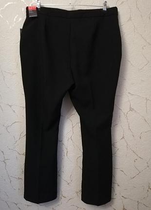 Модні в цьому сезоні брюки кльош кластка нові4 фото