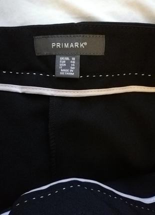 Модні в цьому сезоні брюки кльош кластка нові5 фото