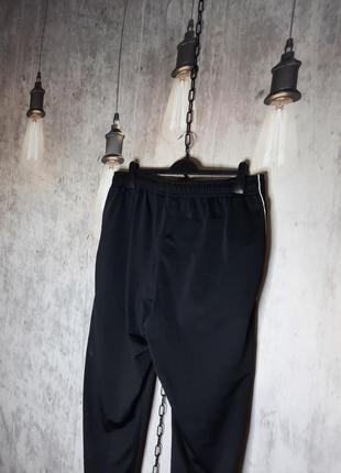 Оригинальные крутые мужские спортивные штаны nike nsw с лампасами размер хл черные6 фото