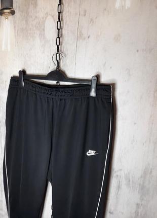 Оригинальные крутые мужские спортивные штаны nike nsw с лампасами размер хл черные2 фото