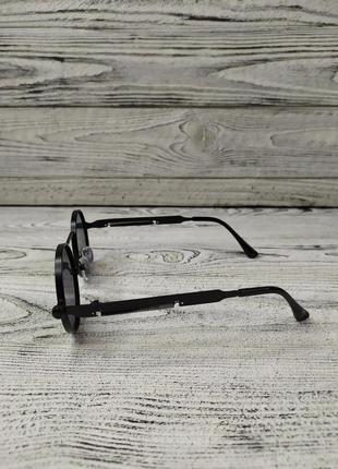 Солнцезащитные очки унисекc, черные, круглые в металлической оправе ( без бренда)4 фото
