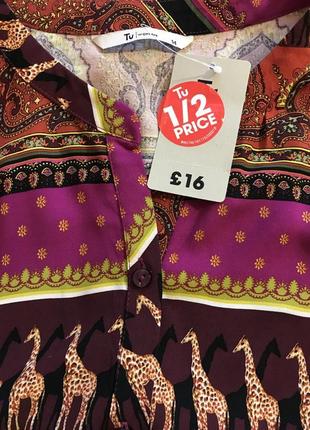 Дуже красива та стильна брендова блузка в малюнках.100% віскоза 21.