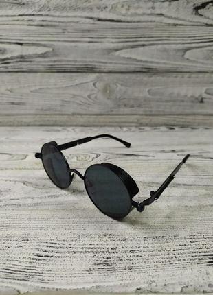 Солнцезащитные очки круглые, черные, унисекс, в золотистой металлической оправе ( без бренда )1 фото