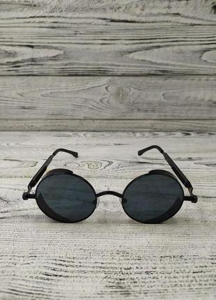 Солнцезащитные очки круглые, черные, унисекс, в золотистой металлической оправе ( без бренда )2 фото