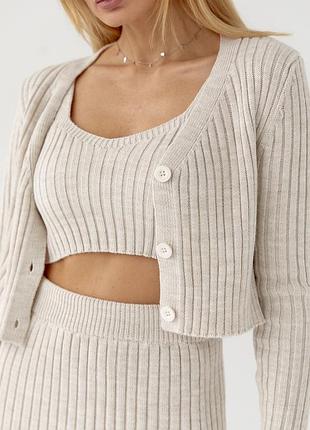 Жіночий костюм зі спідницею, кардиганом і топом4 фото