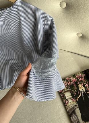 Коротка блузка в смужку10 фото